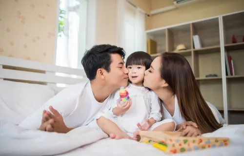 Happy-child-with-parents